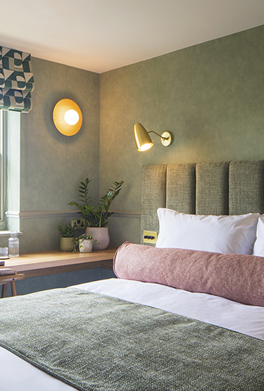 A bedroom at Regency Square Suites, Brighton