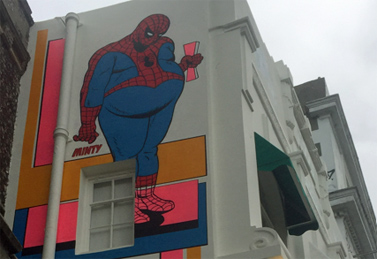 Curvaceous Spiderman street art in Brighton