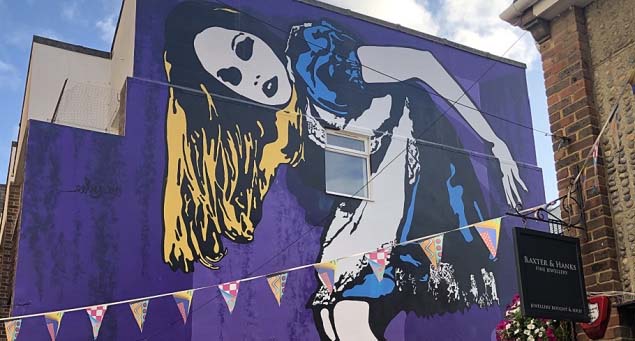 A mural of Alice in Wonderland in the Hanningtons Lane, Brighton